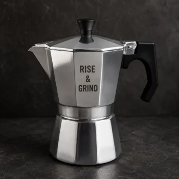 מקינטה עם חריטה RISE AND GRIND